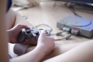 kid playing video game